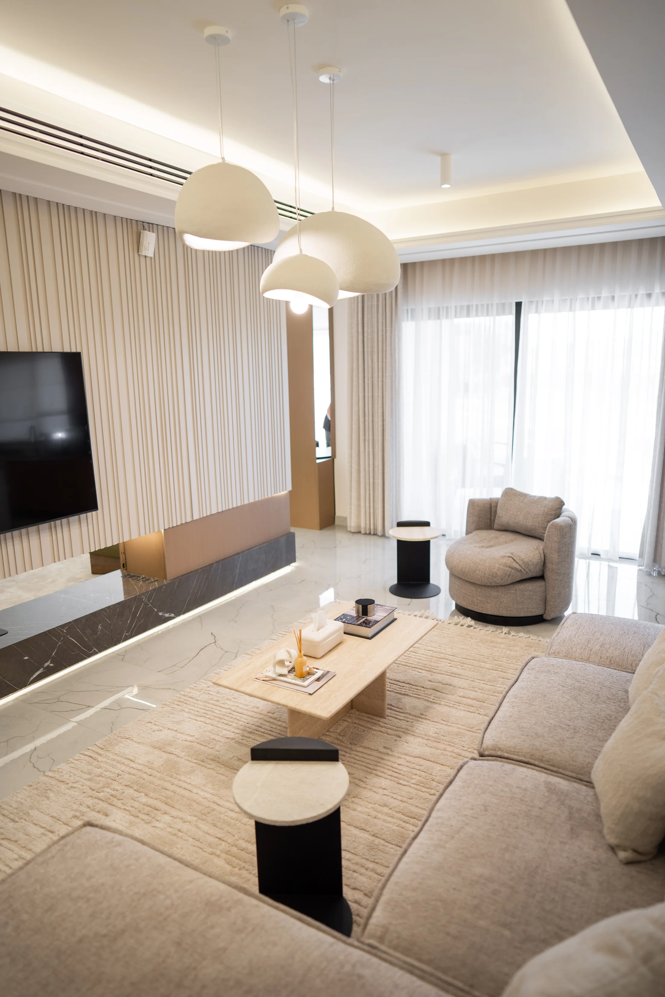 Neutral living room with cream sofa